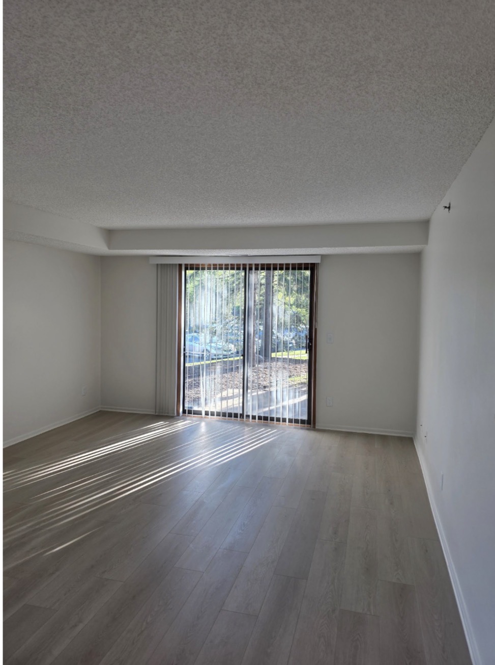 Apartment turnover — bedroom with new LVP