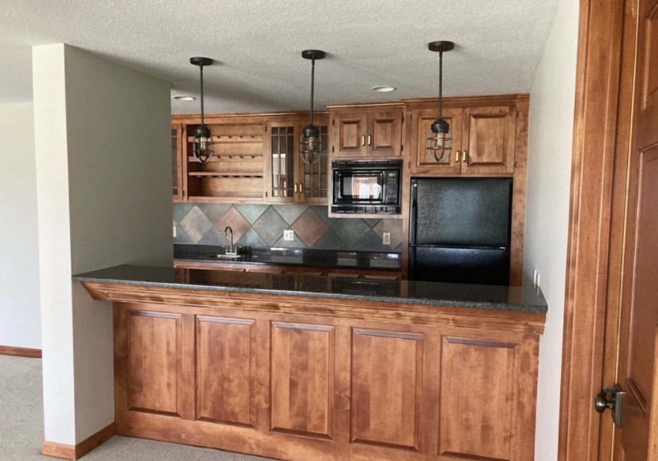 Cherry kitchen with wet bar